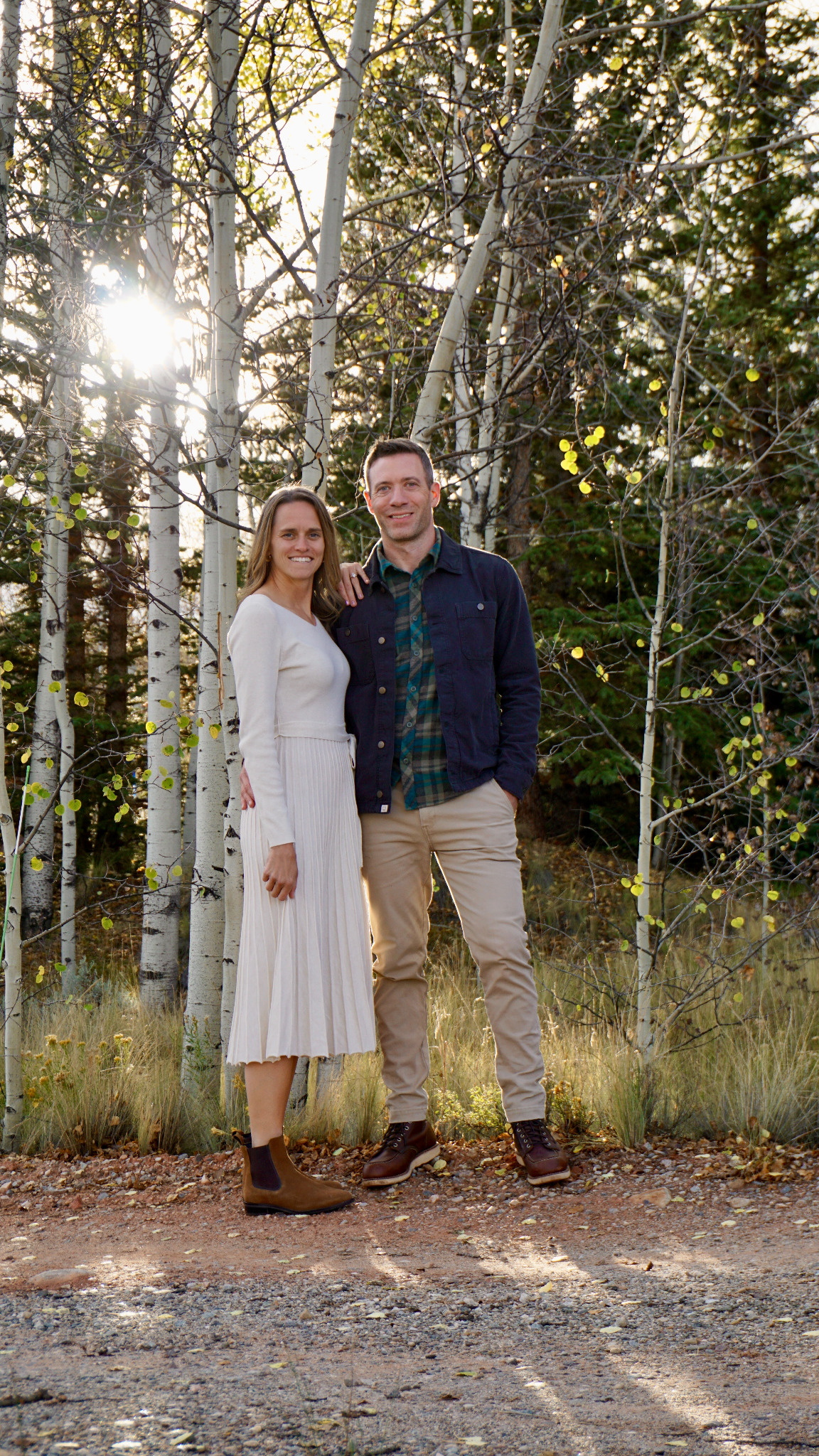 Bryn and Jared together among aspen trees